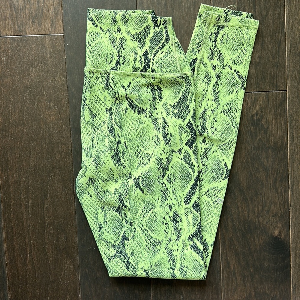 Alo green and black snake-print full length pants